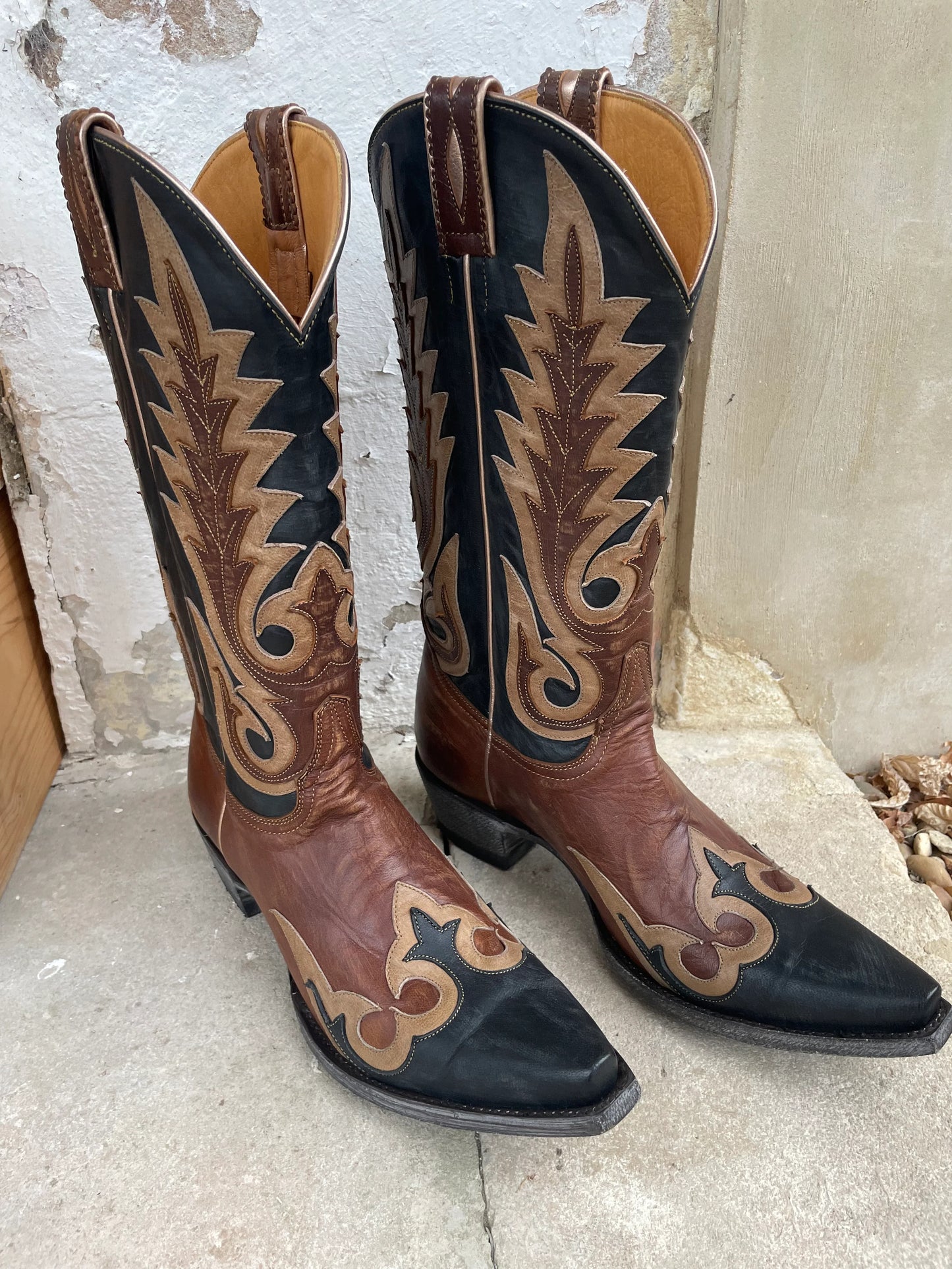 Black boots with stitching