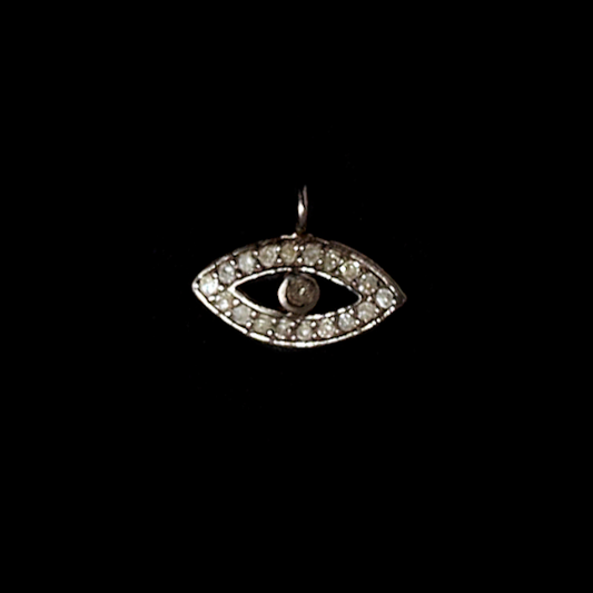 Diamond and Ruby protective eye pendent