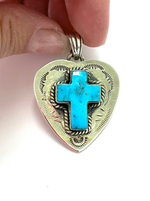 Heart pendent with a cross