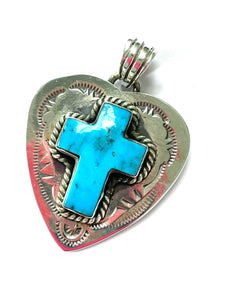 Heart pendent with a cross