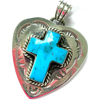 Heart pendent with a cross