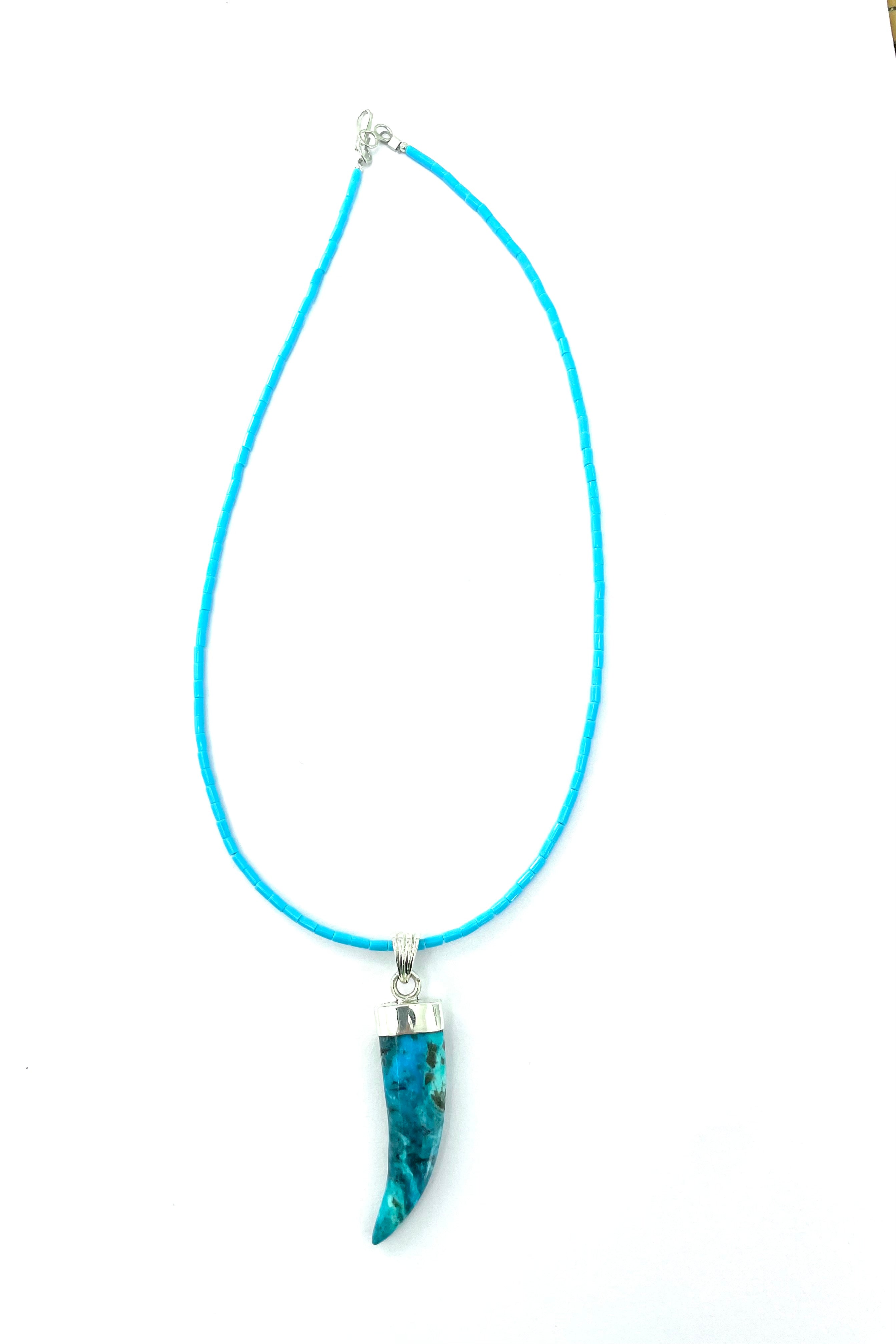 Turquoise carved pendent