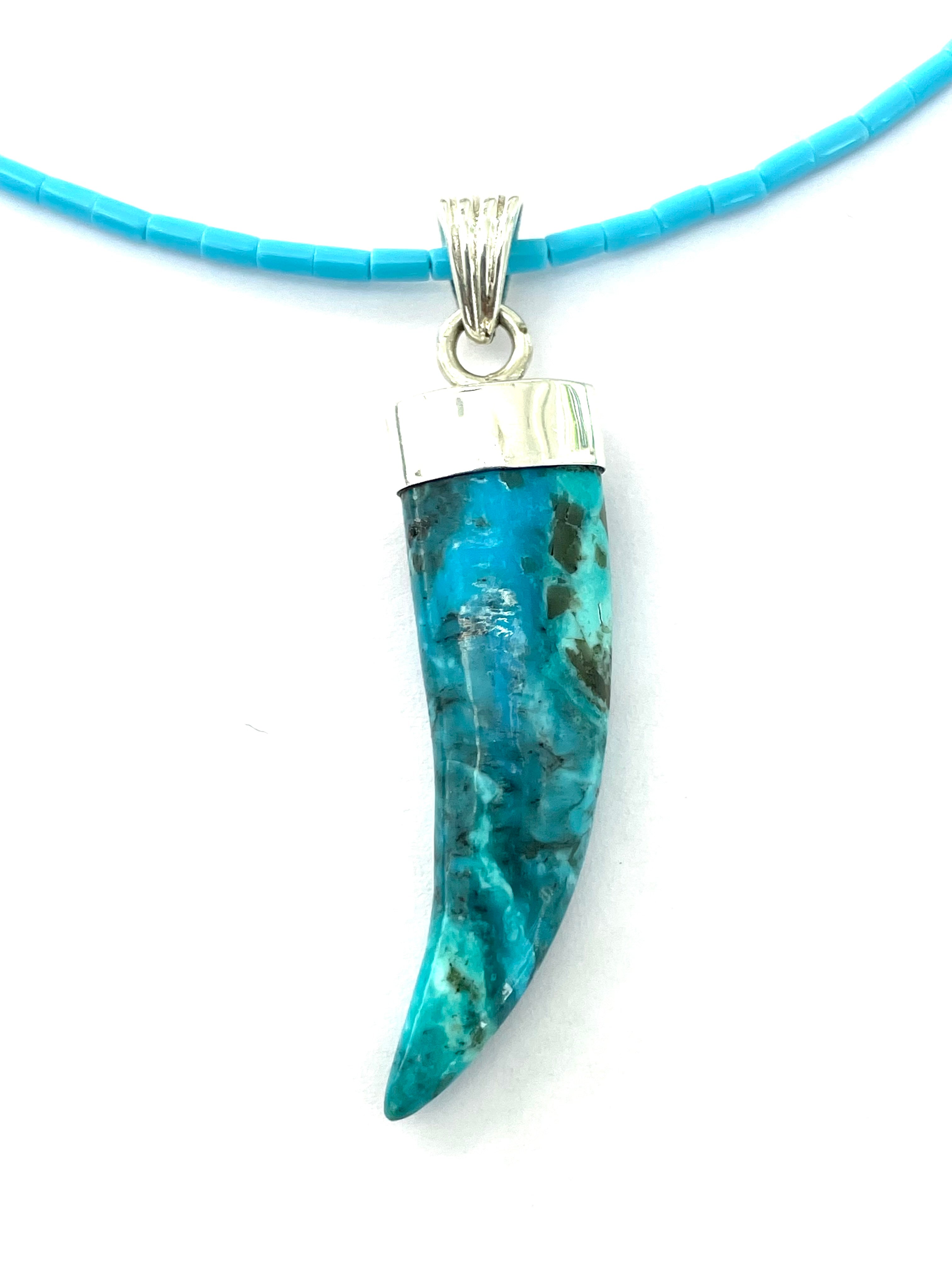 Turquoise carved pendent