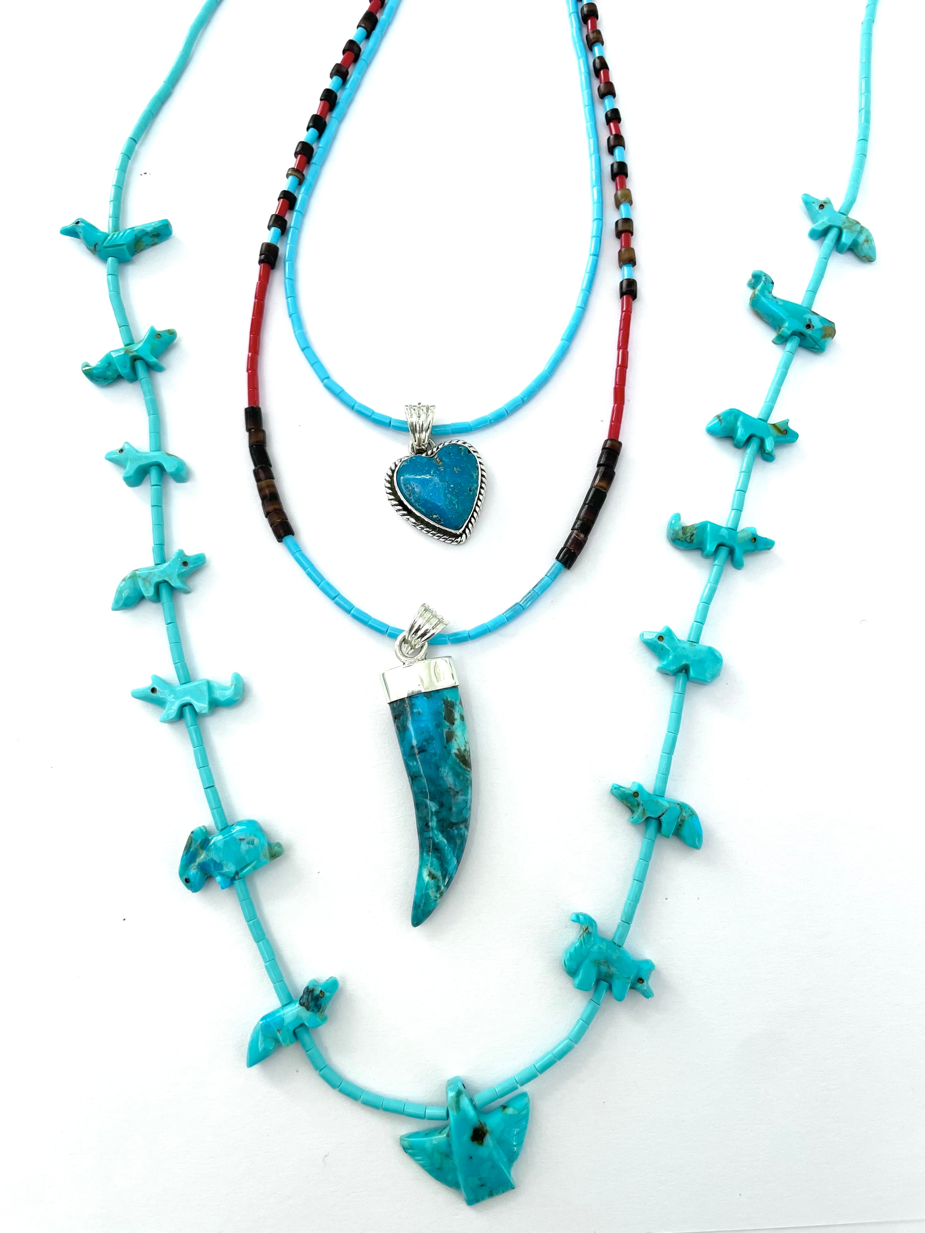 Turquoise carved pendent