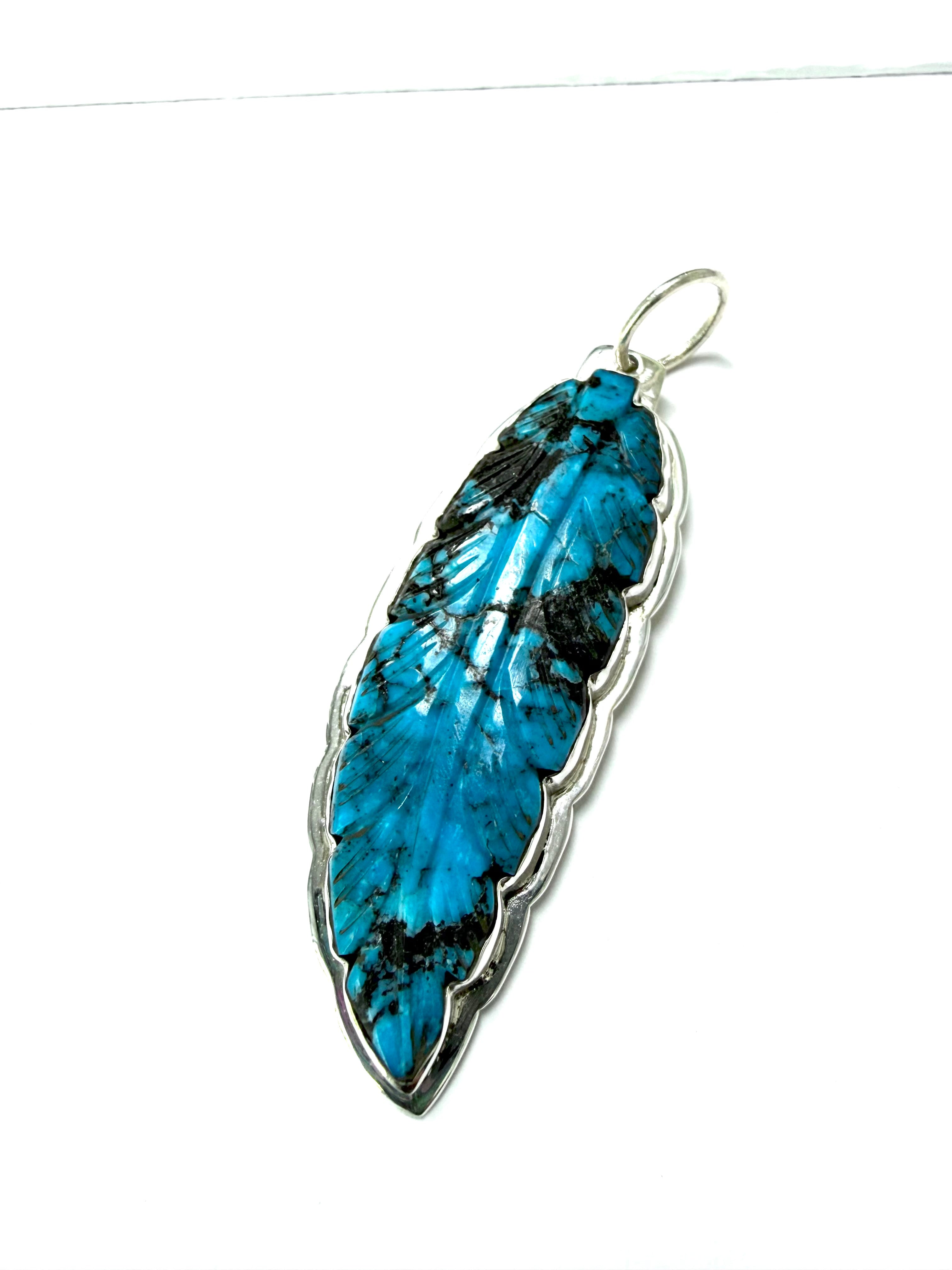 Turquoise feather pendent