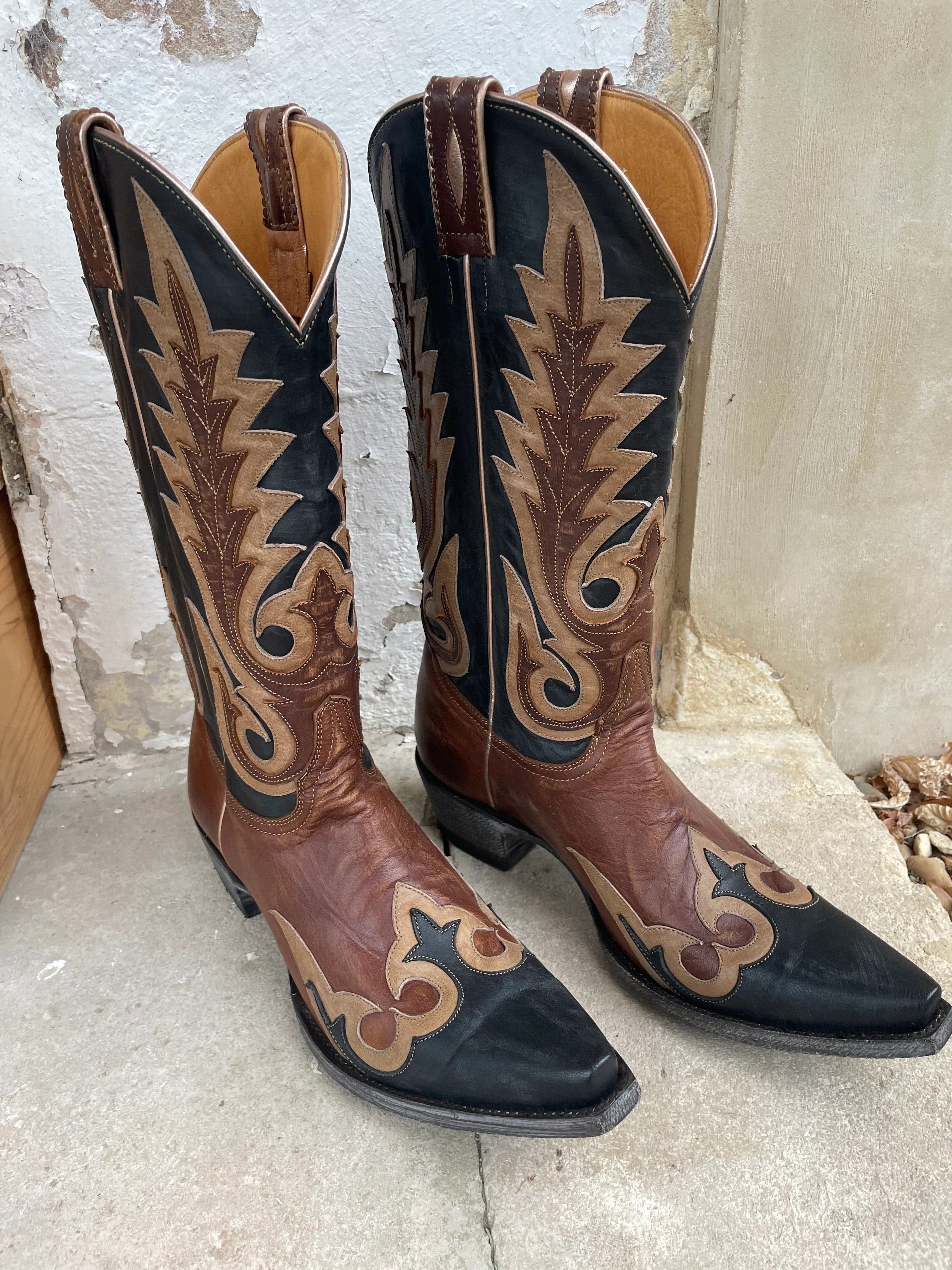 Black boots with stitching