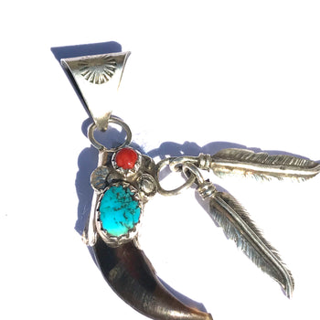 Claw pendent sterling silver w/feathers