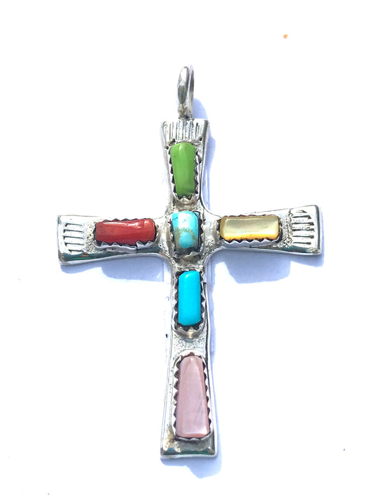 Cross pendent inlaid with stones