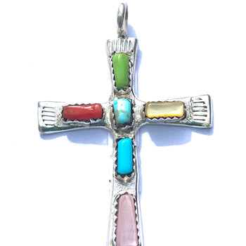 Cross pendent inlaid with stones