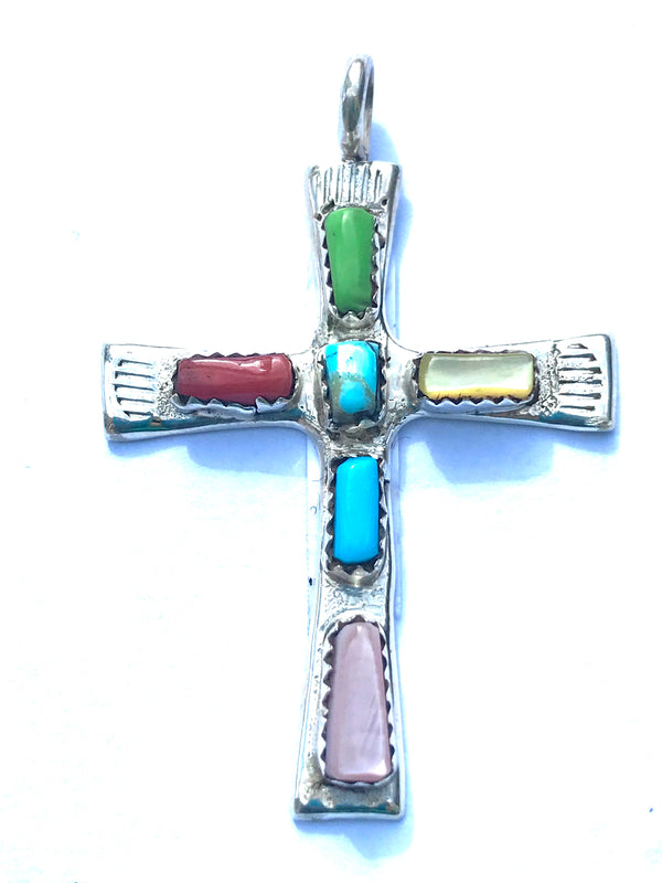 Cross pendent inlaid with stones